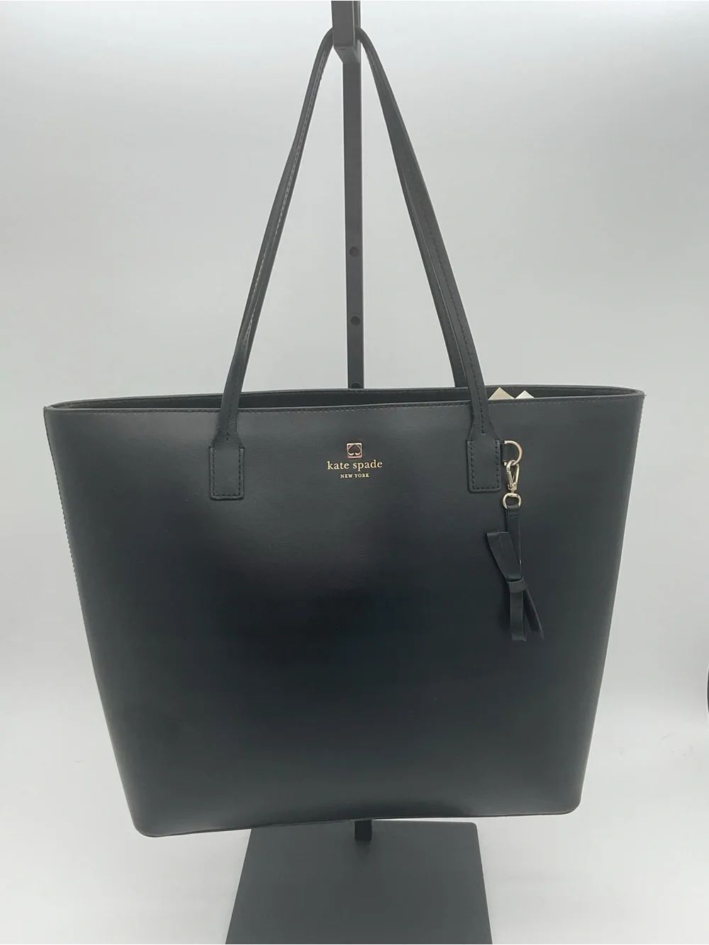 kate spade Sawyer Street Black Leather Tote with Bow Charm - Read